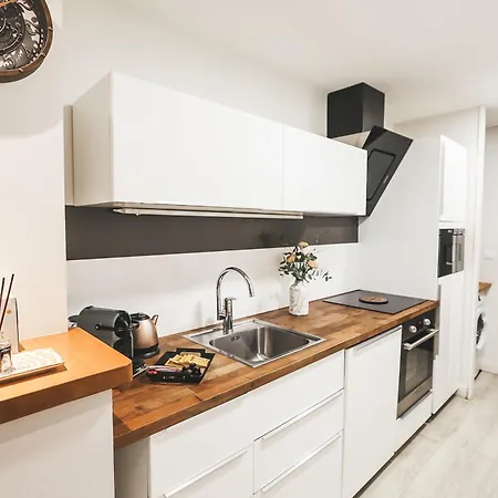 Daire Suit'home Commerce